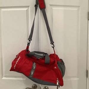 Never used High Sierra duffle bag, red and gray
